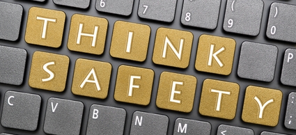 Golden think safety key on keyboard
